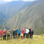 People posing on the Inca Trail to Machu Picchu in Peru
